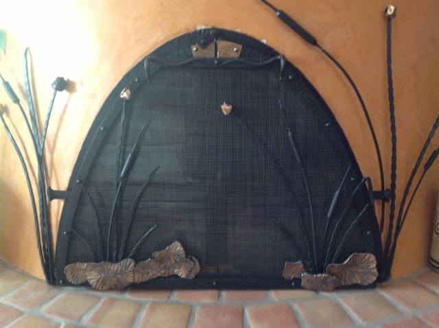 We incorporated cattails and waterlilies visible at the pond thru the window