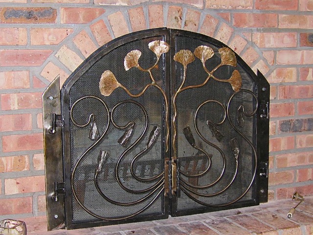 Outer door with bronze gingko leaves and inner doors are screened